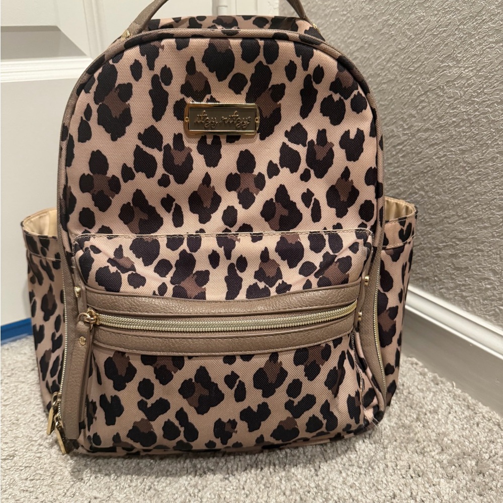 Itzy Ritzy Tan and Black Leopard Diaper backpack